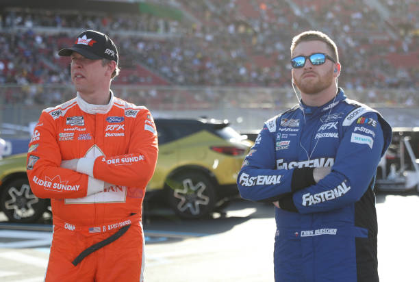 Brad Keselowski and Chris Buescher standing together