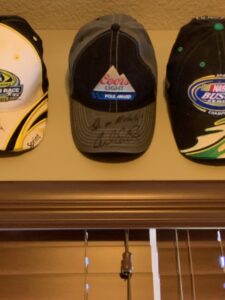 a Coors Light Pole Award winner hat autographed by Carl Edwards
