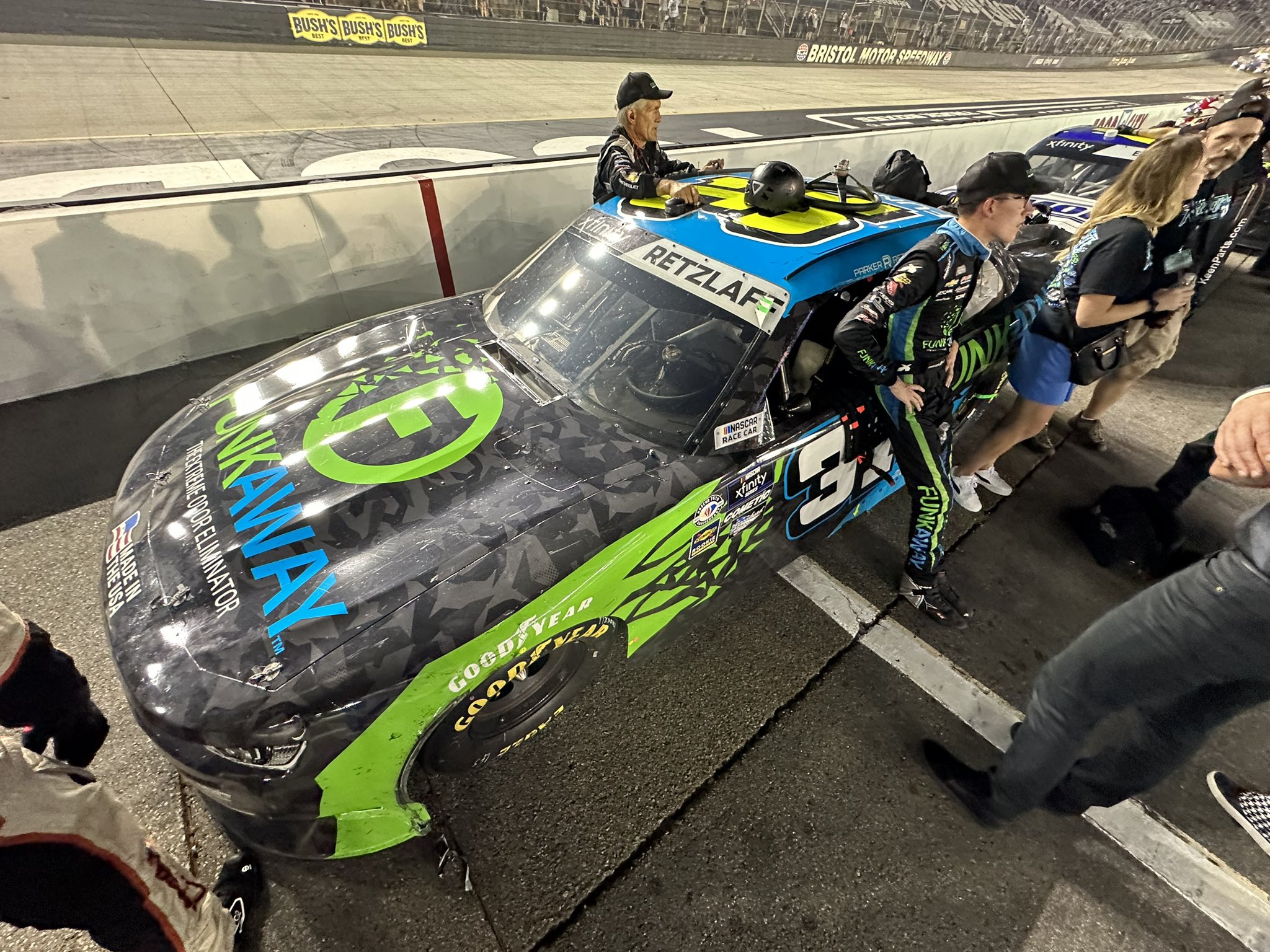 Parker Retzlaff leans against his car following a hard-fought battle at Bristol Motor Speedway.