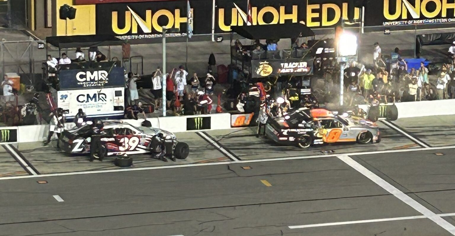 Ryan Sieg and Josh Berry getting a pit stop done to their cars during the Xfinity Daytona Fall race