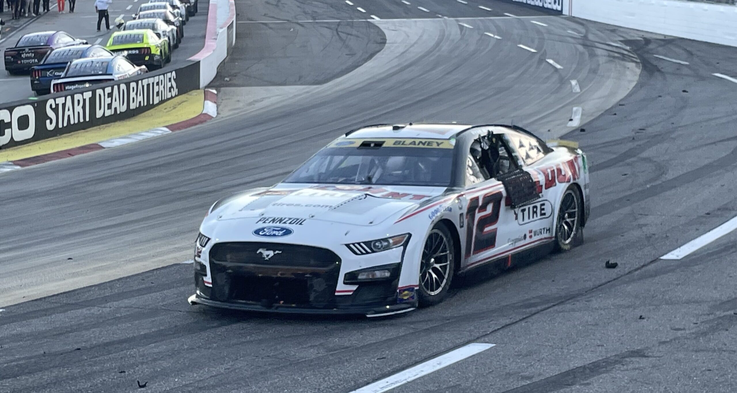 Ryan Blaney waving to fans after his Fall Martinsville win, 2023