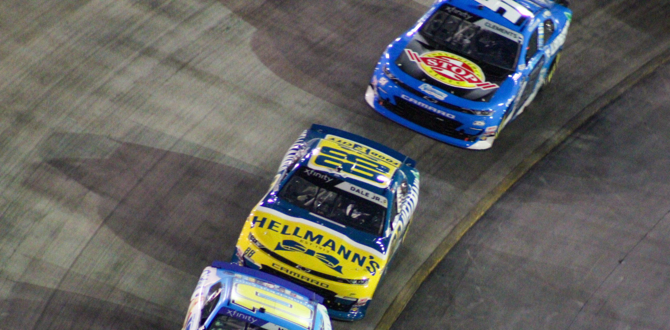Jeremy Clements running directly behind Dale Earnhardt Jr. during the 2023 Xfinity Bristol Night Race