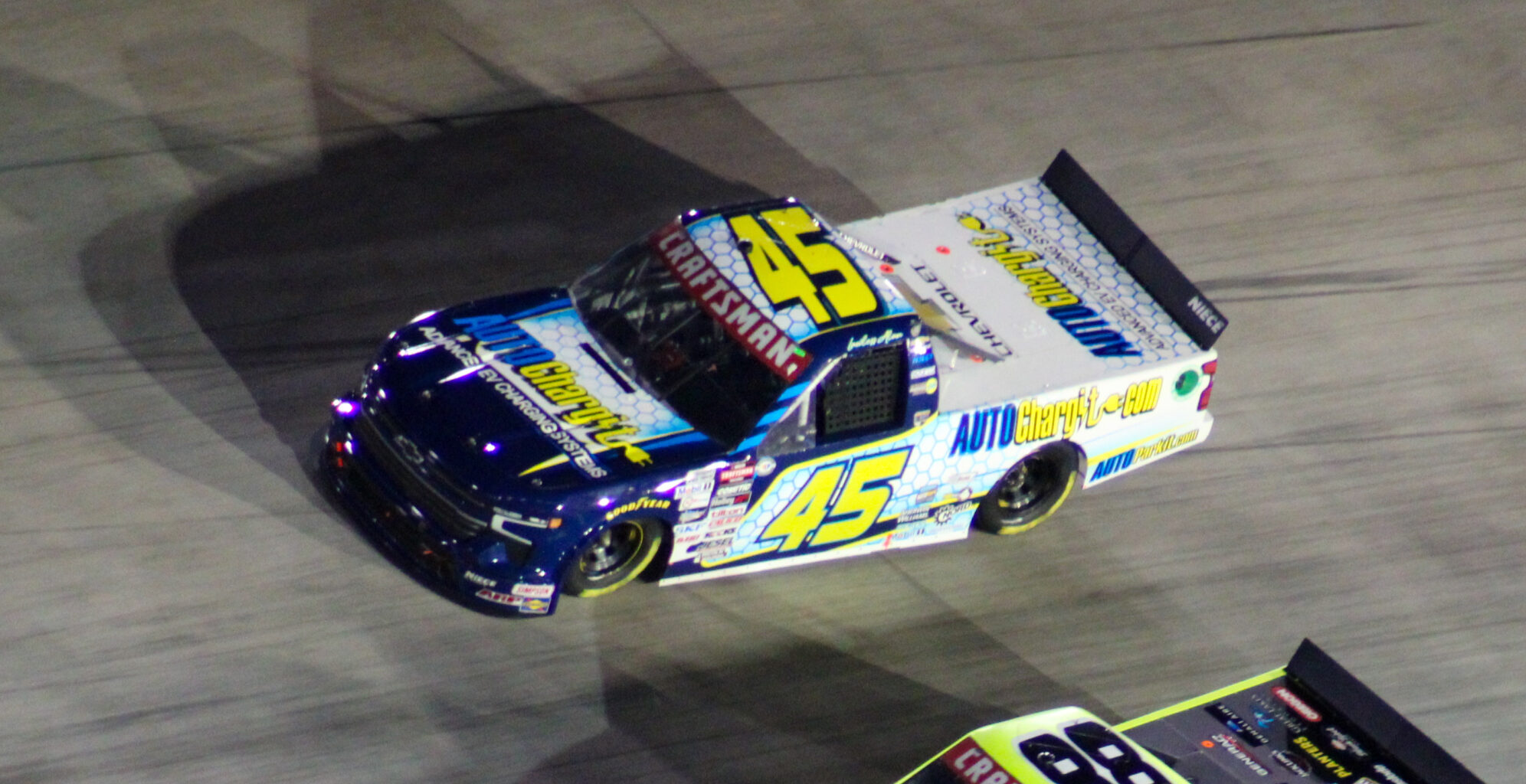 Lawless Alan running the high line with Matt Crafton on the inside during the 2023 Truck Bristol Night Race