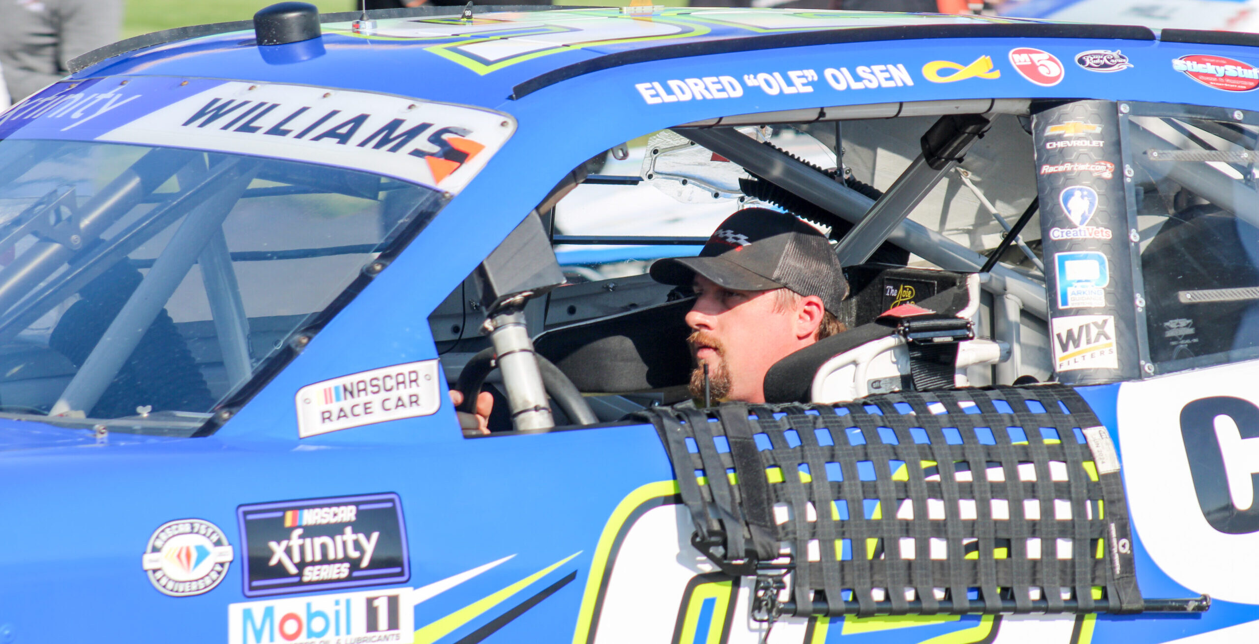 Josh Williams sits in his 92 car during the 2023 Fall Xfinity Kansas weekend