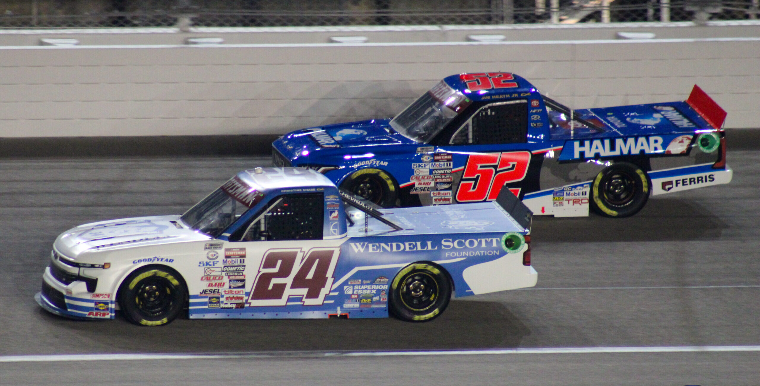 Rajah Caruth battles Stewart Friesen during the 2023 Truck Fall Kansas race