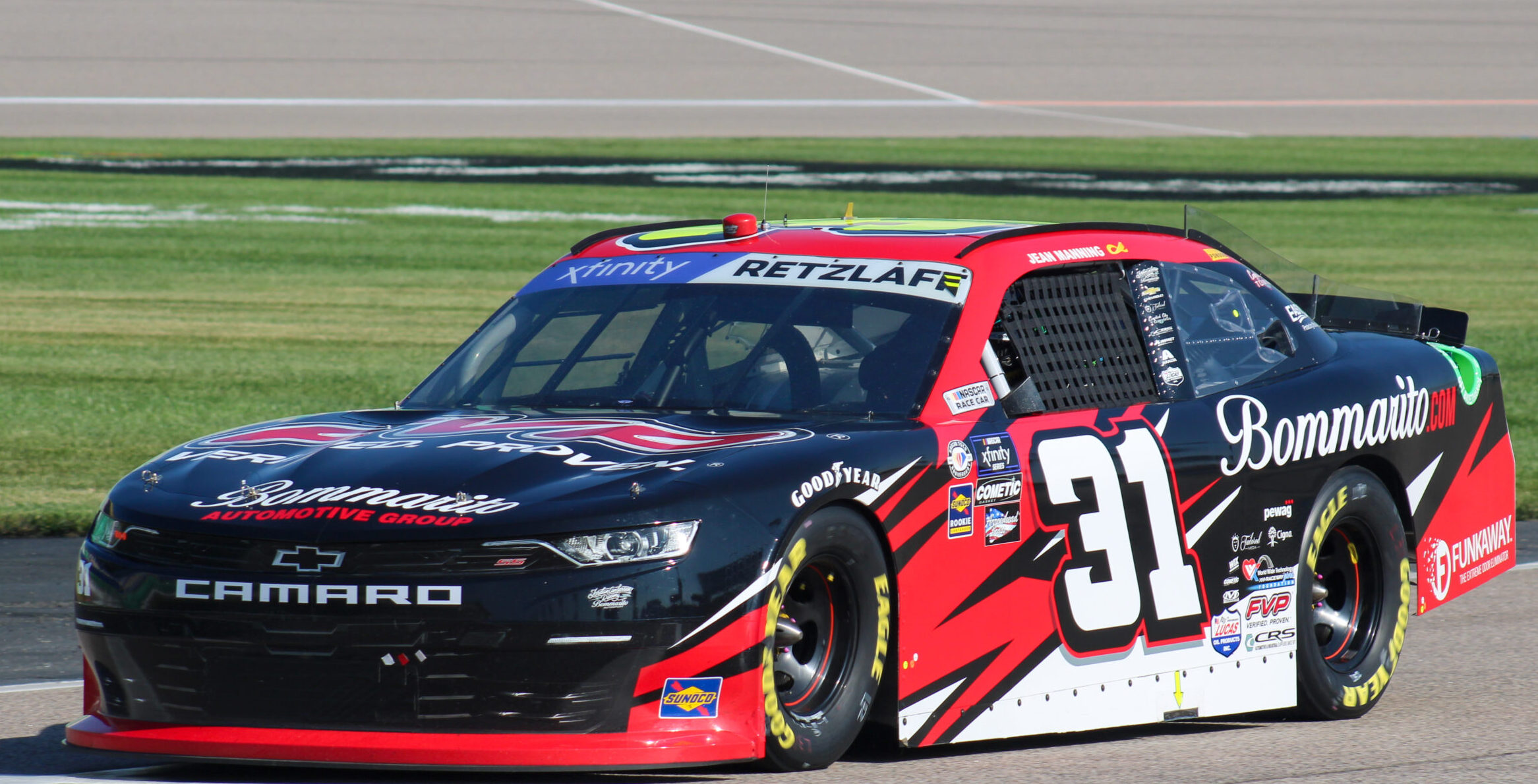 Parker Retzlaff's car sitting on pit road during the 2023 Xfinity Fall Kansas weekend