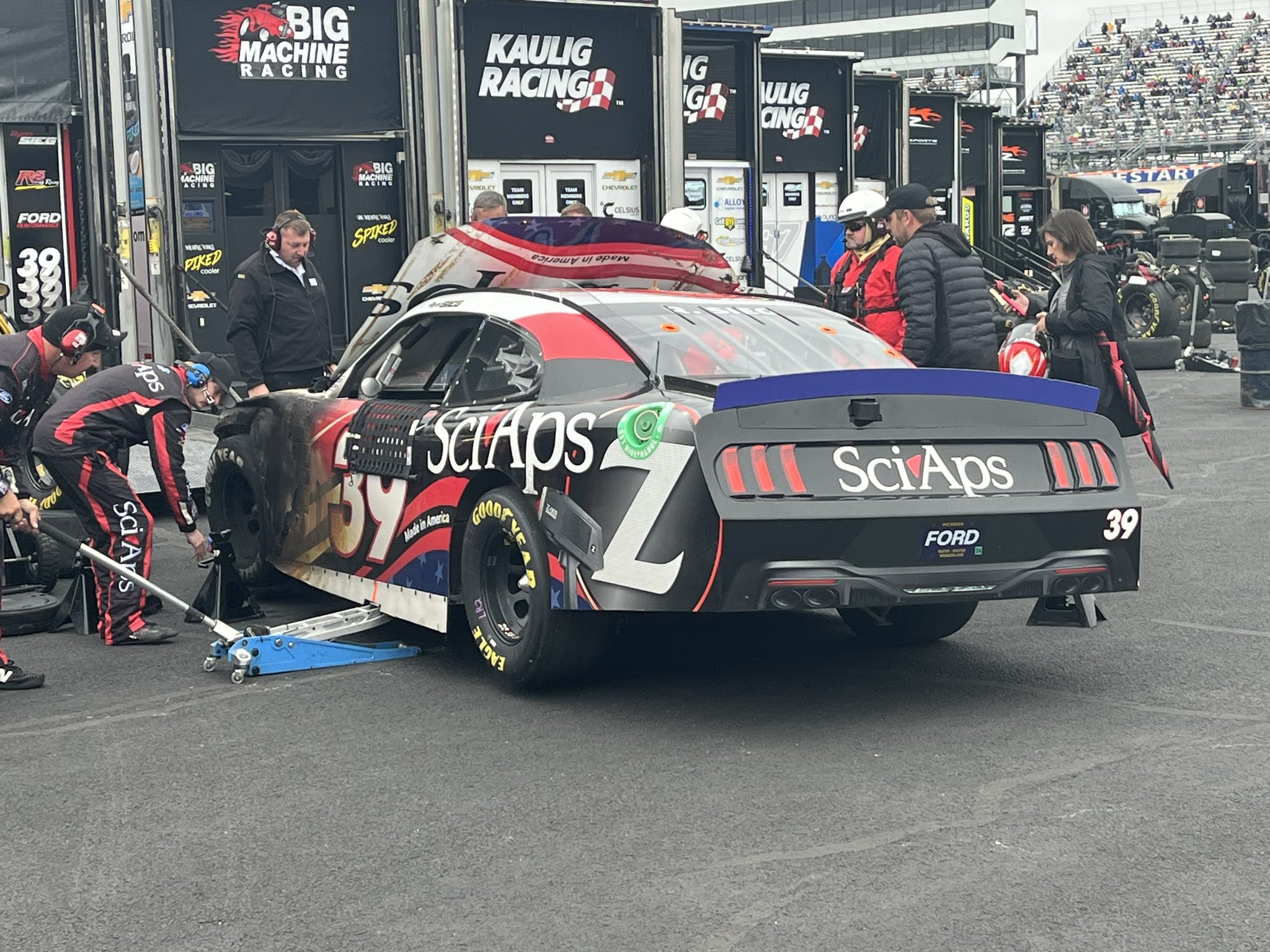 Ryan Sieg's No. 39 being loaded onto the hauler following a firey wreck in the BetRivers 200.